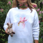 Ham-let Long Sleeve T-shirt. Original drawing of Iren's happy little piglet on soft and comfortable Adult Long Sleeve T-shirts. Some customers like to wear them with pajama pants to bed. Cotton inside and polyester out, machine wash.