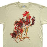 Two Roosters short sleeve T-shirt. Color: Alpine Spruce. Original drawing of Iren’s gorgeous chicks on  light and durable Vapor T-shirts, moisture wicking and fast drying, perfect for sports or everyday use. Spun poly with the feel of cotton. Machine wash.